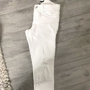 White slightly ripped jeans